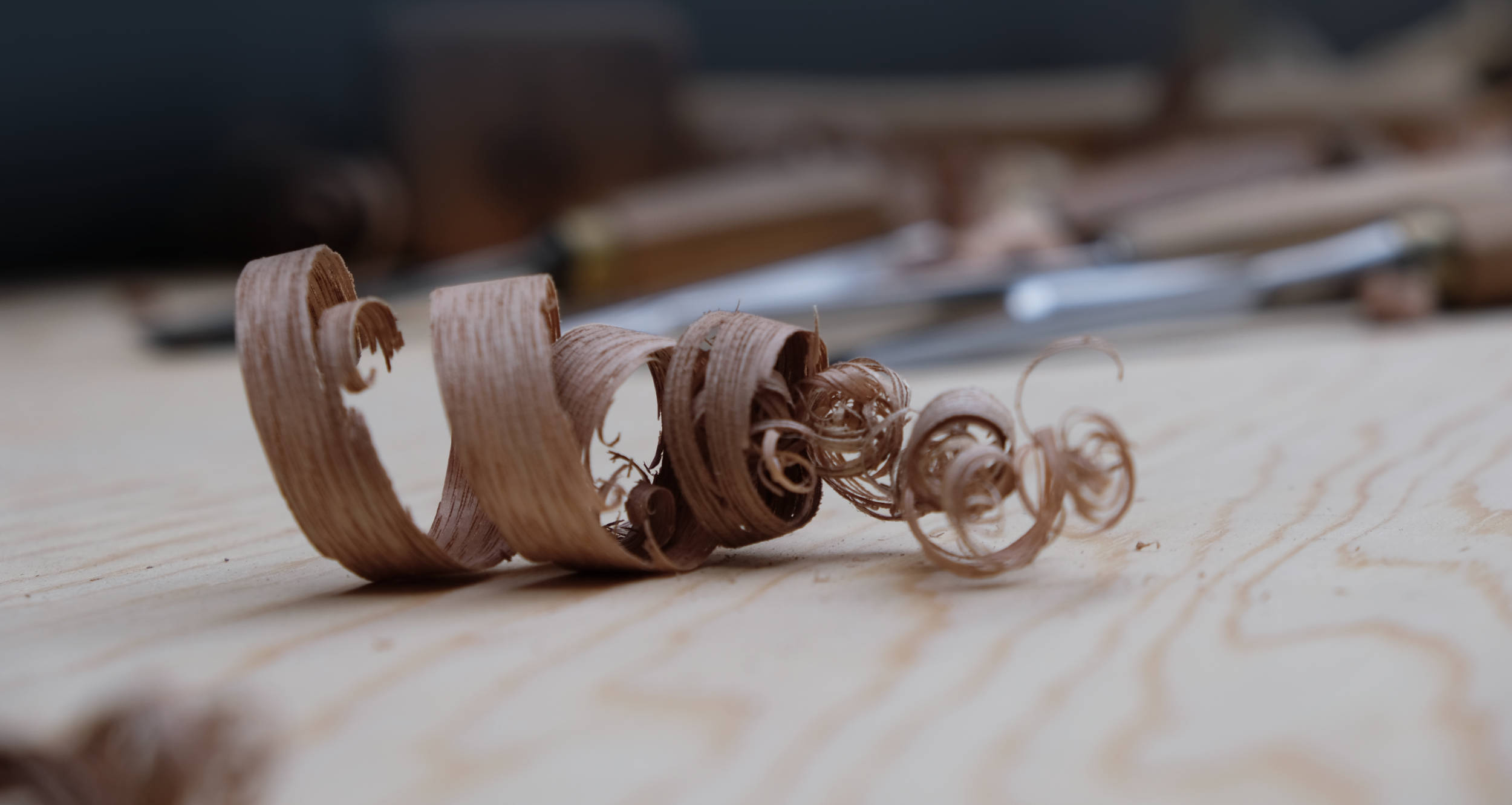 Wood shavings on a workbench.
